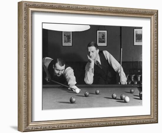 Snooker Player Prepares to Play a Shot as His Partner Looks On-null-Framed Photographic Print