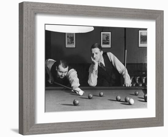 Snooker Player Prepares to Play a Shot as His Partner Looks On-null-Framed Photographic Print