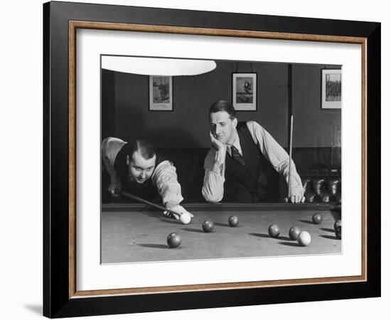 Snooker Player Prepares to Play a Shot as His Partner Looks On-null-Framed Photographic Print