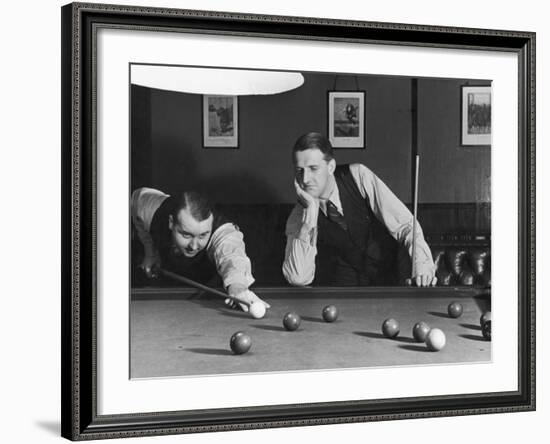 Snooker Player Prepares to Play a Shot as His Partner Looks On-null-Framed Photographic Print