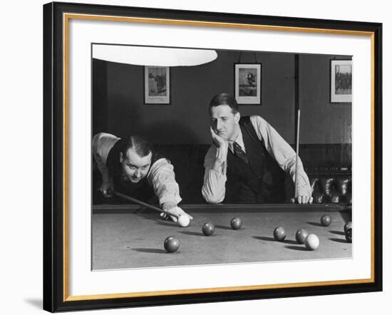 Snooker Player Prepares to Play a Shot as His Partner Looks On-null-Framed Photographic Print