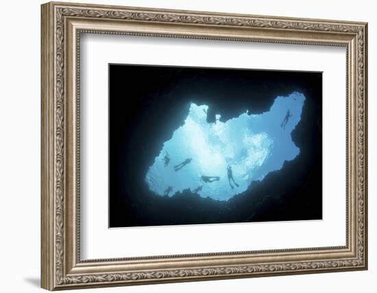 Snorkelers Swim Above a Blue Hole on Palau's Barrier Reef-Stocktrek Images-Framed Photographic Print