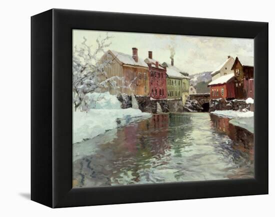 Snow-Covered Buildings by a River-Fritz Thaulow-Framed Premier Image Canvas