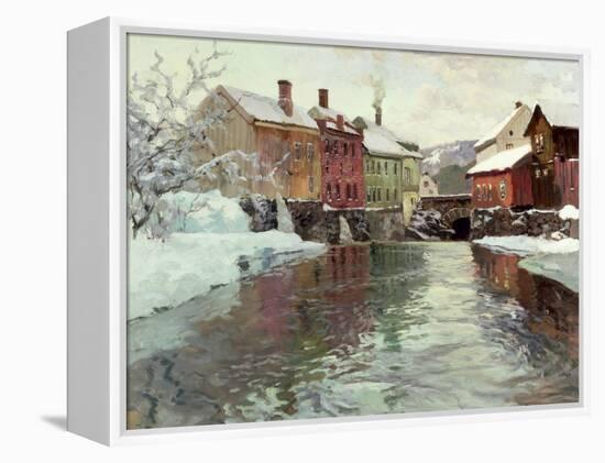 Snow-Covered Buildings by a River-Fritz Thaulow-Framed Premier Image Canvas