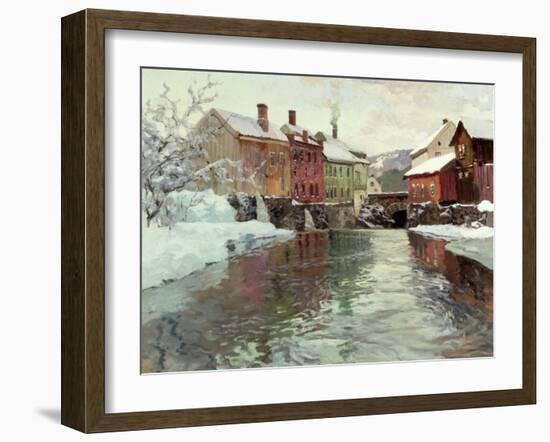 Snow-Covered Buildings by a River-Fritz Thaulow-Framed Giclee Print