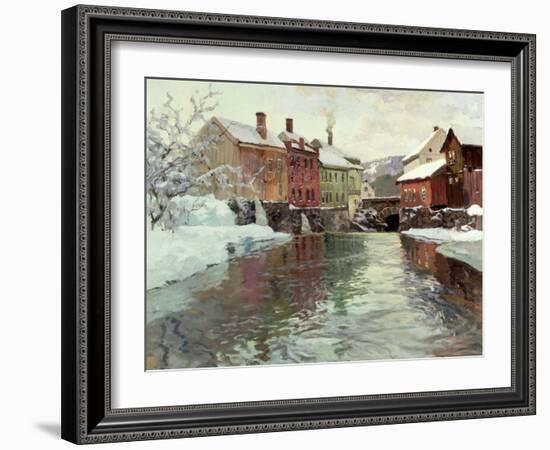 Snow-Covered Buildings by a River-Fritz Thaulow-Framed Giclee Print