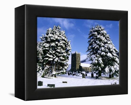 Snow Covered Church and Cemetery-Ashley Cooper-Framed Premier Image Canvas