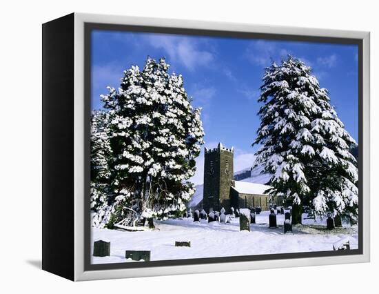 Snow Covered Church and Cemetery-Ashley Cooper-Framed Premier Image Canvas