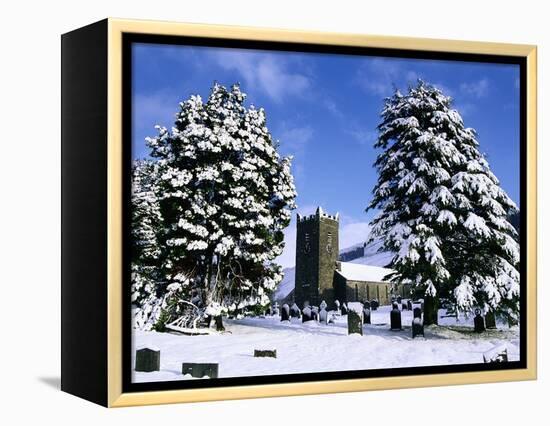 Snow Covered Church and Cemetery-Ashley Cooper-Framed Premier Image Canvas