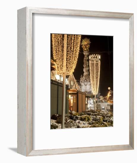 Snow-Covered Flowers, Christmas Decorations and Baroque Trinity Column at Christmas Market, Austria-Richard Nebesky-Framed Photographic Print