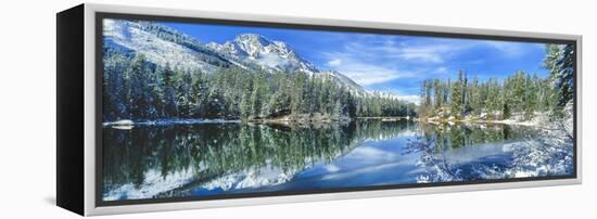 Snow covered mountain and trees reflected in lake, Grand Tetons, Wyoming, USA-Panoramic Images-Framed Premier Image Canvas