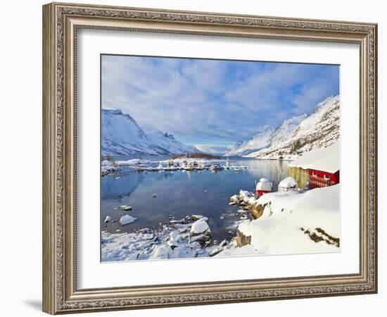 Snow Covered Mountains, Boathouse and Moorings in Norwegian Fjord Village of Ersfjord, Kvaloya Isla-Neale Clark-Framed Photographic Print