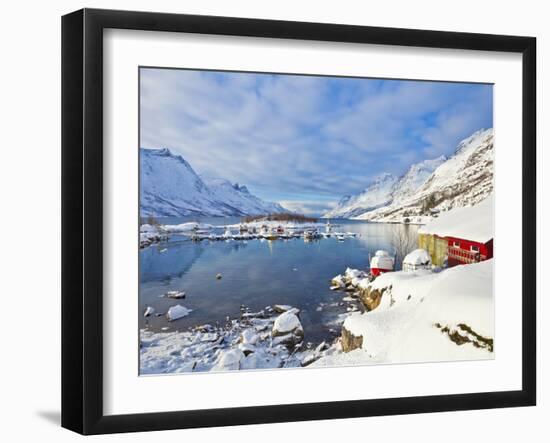 Snow Covered Mountains, Boathouse and Moorings in Norwegian Fjord Village of Ersfjord, Kvaloya Isla-Neale Clark-Framed Photographic Print