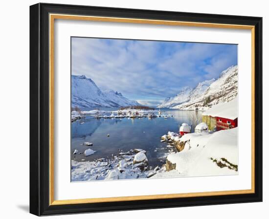 Snow Covered Mountains, Boathouse and Moorings in Norwegian Fjord Village of Ersfjord, Kvaloya Isla-Neale Clark-Framed Photographic Print