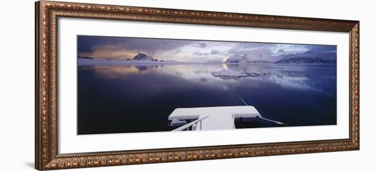 Snow Covered Pier with Mountains in the Background, Lofoten, Nordland County, Norway-null-Framed Photographic Print