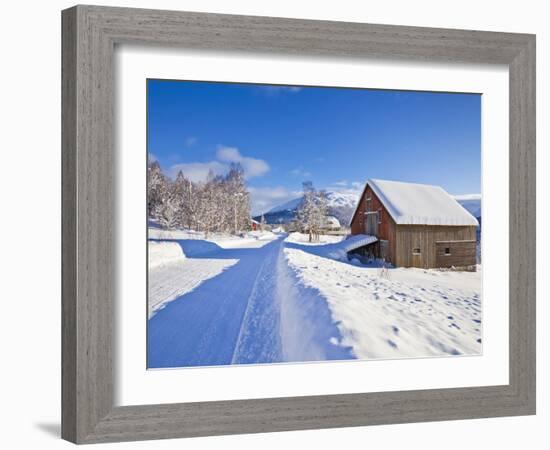 Snow Covered Road, Barn and Chalets in Norwegian Village of Laukslett, Troms, North Norway, Scandin-Neale Clark-Framed Photographic Print