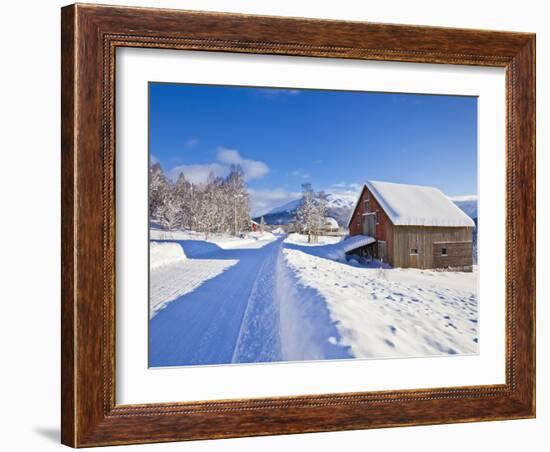 Snow Covered Road, Barn and Chalets in Norwegian Village of Laukslett, Troms, North Norway, Scandin-Neale Clark-Framed Photographic Print