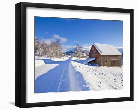 Snow Covered Road, Barn and Chalets in Norwegian Village of Laukslett, Troms, North Norway, Scandin-Neale Clark-Framed Photographic Print