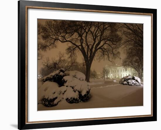 Snow Covers the Lawn in Front of the White House in Washington-null-Framed Photographic Print