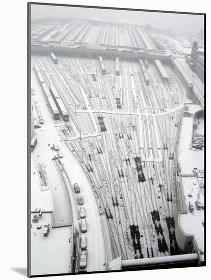 Snow Covers the Railroad Tracks at the Westside Railyard as Snow Falls on New York-null-Mounted Photographic Print