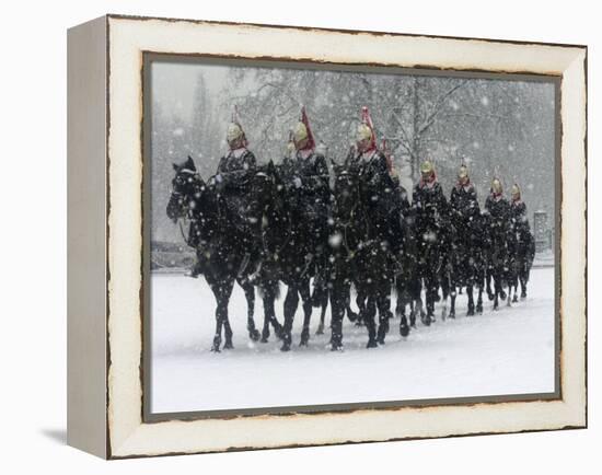 Snow Falling on Members of the Household Cavalry as They Cross Horse Guards Parade-null-Framed Premier Image Canvas