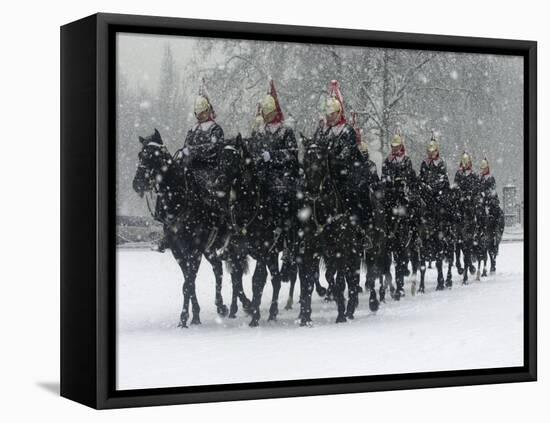 Snow Falling on Members of the Household Cavalry as They Cross Horse Guards Parade-null-Framed Premier Image Canvas