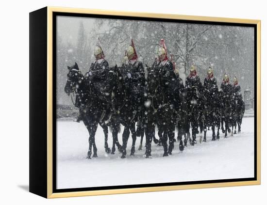 Snow Falling on Members of the Household Cavalry as They Cross Horse Guards Parade-null-Framed Premier Image Canvas