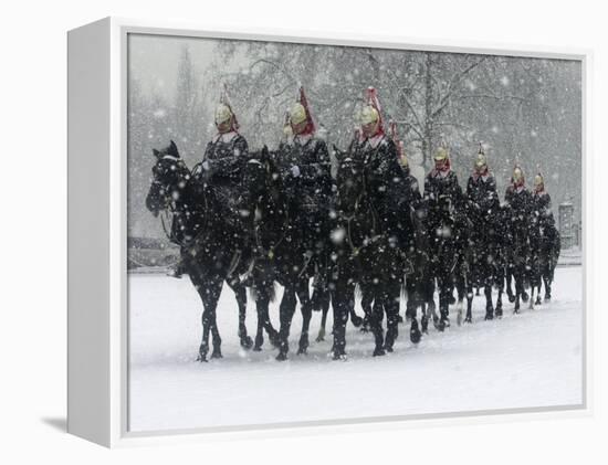 Snow Falling on Members of the Household Cavalry as They Cross Horse Guards Parade-null-Framed Premier Image Canvas