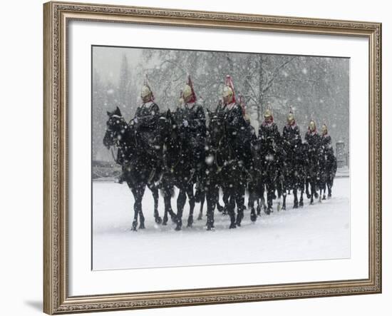 Snow Falling on Members of the Household Cavalry as They Cross Horse Guards Parade-null-Framed Photographic Print