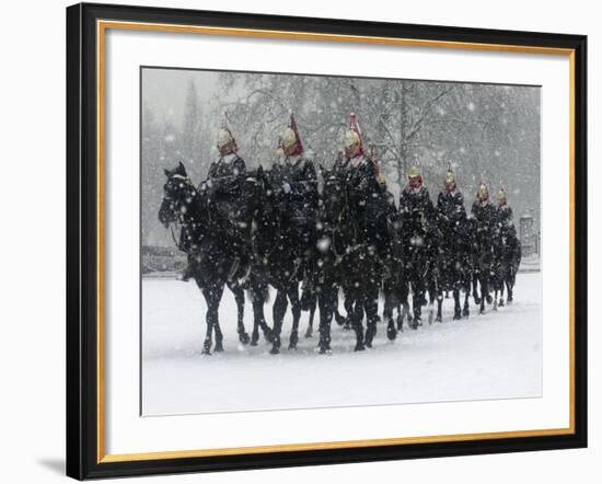 Snow Falling on Members of the Household Cavalry as They Cross Horse Guards Parade-null-Framed Photographic Print