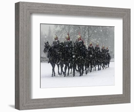 Snow Falling on Members of the Household Cavalry as They Cross Horse Guards Parade-null-Framed Photographic Print