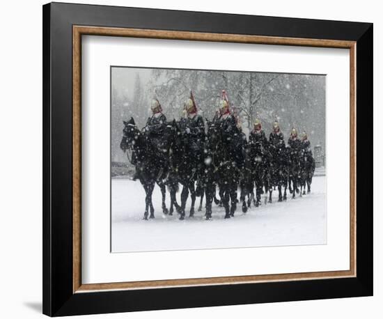 Snow Falling on Members of the Household Cavalry as They Cross Horse Guards Parade-null-Framed Photographic Print