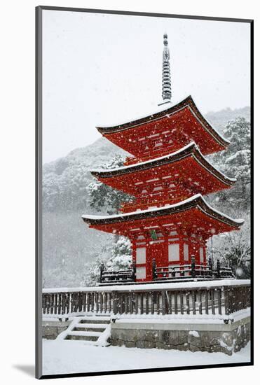 Snow falling on small red pagoda, Kiyomizu-dera Temple, UNESCO World Heritage Site, Kyoto, Japan, A-Damien Douxchamps-Mounted Photographic Print