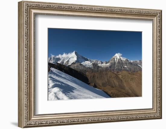 Snow on the Nyile La, a 4950m pass, and the peak of Jitchu Drake at 6714m in the distance, Bhutan,-Alex Treadway-Framed Photographic Print