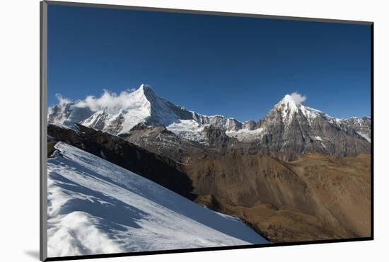 Snow on the Nyile La, a 4950m pass, and the peak of Jitchu Drake at 6714m in the distance, Bhutan,-Alex Treadway-Mounted Photographic Print