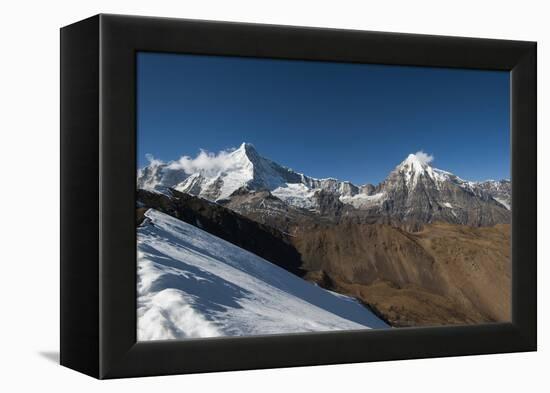 Snow on the Nyile La, a 4950m pass, and the peak of Jitchu Drake at 6714m in the distance, Bhutan,-Alex Treadway-Framed Premier Image Canvas