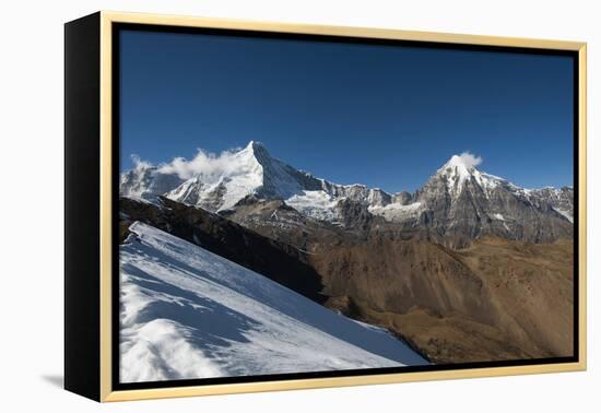 Snow on the Nyile La, a 4950m pass, and the peak of Jitchu Drake at 6714m in the distance, Bhutan,-Alex Treadway-Framed Premier Image Canvas