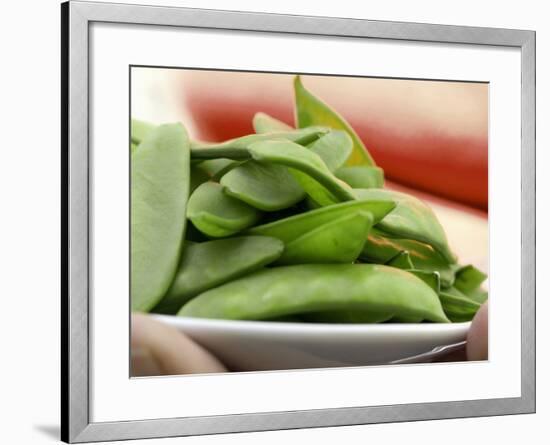 Snow Peas in a Dish Being Held-Foodcollection-Framed Photographic Print