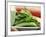 Snow Peas in a Dish Being Held-Foodcollection-Framed Photographic Print