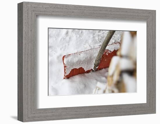 Snow shovel, snow, wood pile, detail, medium close-up, blur-Martin Ley-Framed Photographic Print