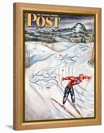 "Snow Skiier After the Falls," Saturday Evening Post Cover, January 25, 1947-Constantin Alajalov-Framed Premier Image Canvas