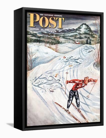 "Snow Skiier After the Falls," Saturday Evening Post Cover, January 25, 1947-Constantin Alajalov-Framed Premier Image Canvas