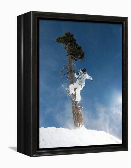 Snowboarder Mid-Air During Jump-null-Framed Premier Image Canvas