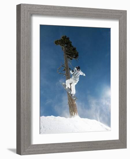 Snowboarder Mid-Air During Jump-null-Framed Photographic Print