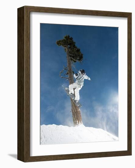 Snowboarder Mid-Air During Jump-null-Framed Photographic Print