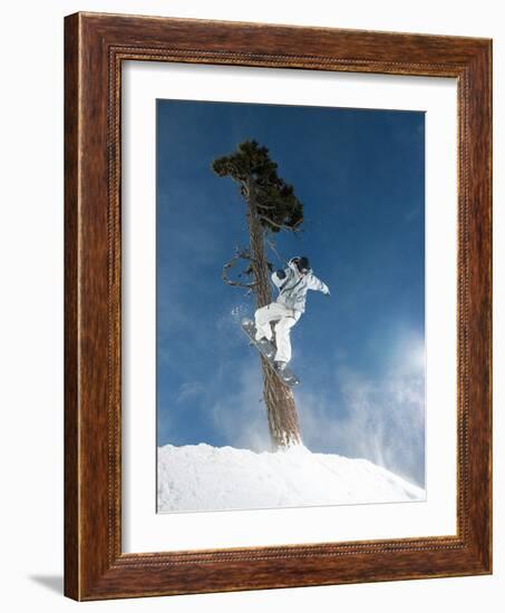 Snowboarder Mid-Air During Jump-null-Framed Photographic Print