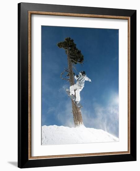 Snowboarder Mid-Air During Jump-null-Framed Photographic Print