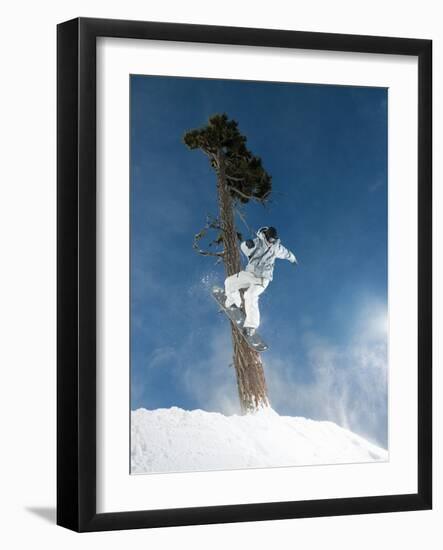 Snowboarder Mid-Air During Jump-null-Framed Photographic Print