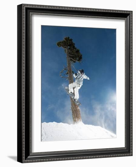 Snowboarder Mid-Air During Jump-null-Framed Photographic Print