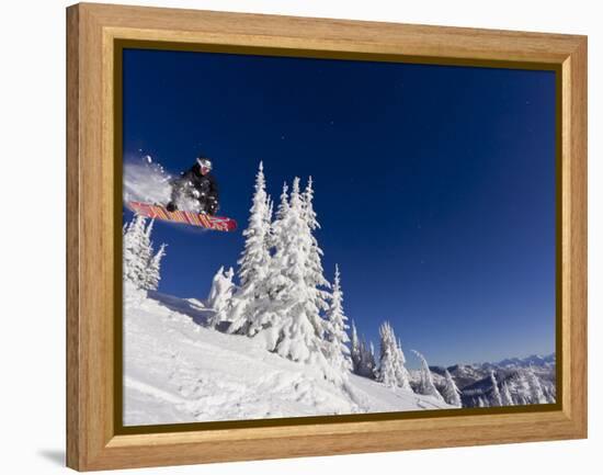 Snowboarding Action at Whitefish Mountain Resort in Whitefish, Montana, USA-Chuck Haney-Framed Premier Image Canvas